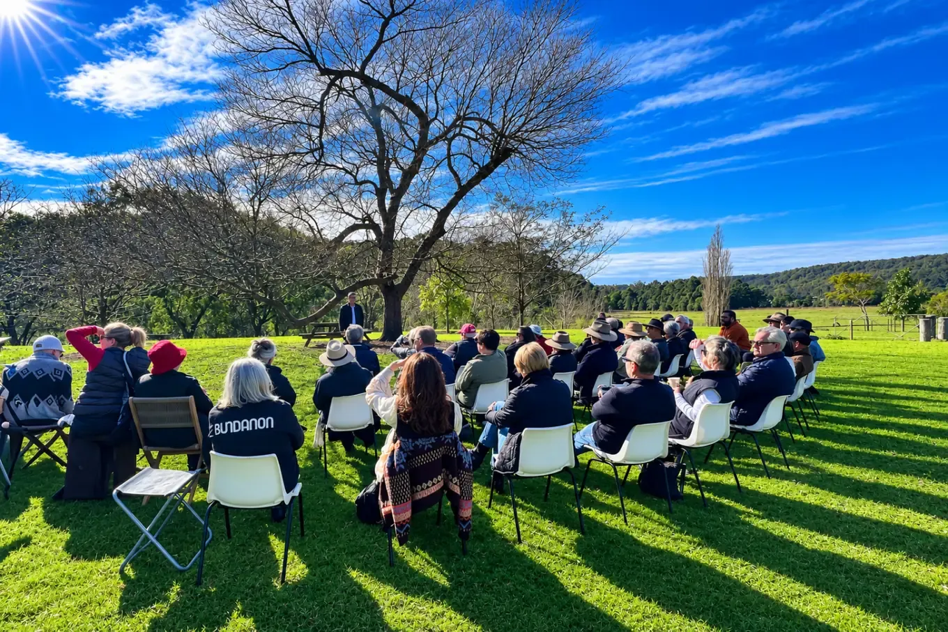 Group on the lawn in front of Bundanon Homestead